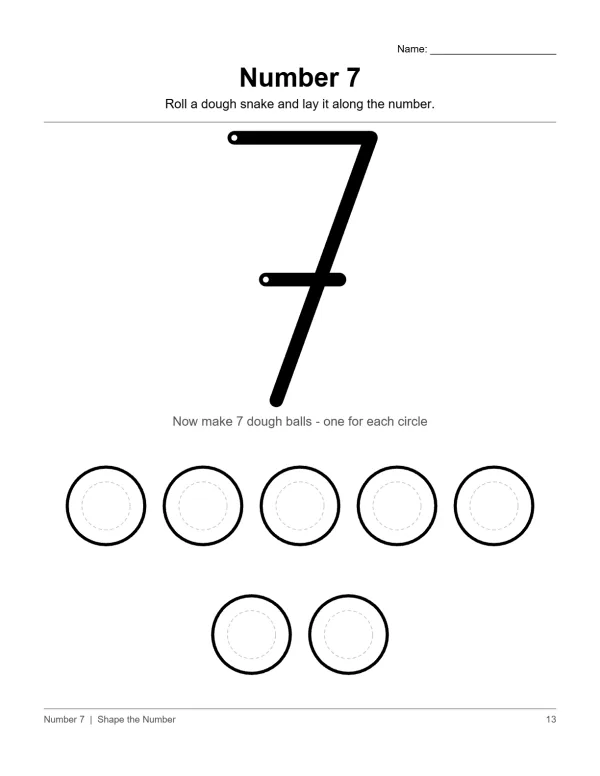 A worksheet with a large number 7 and seven circles below for play dough placement.